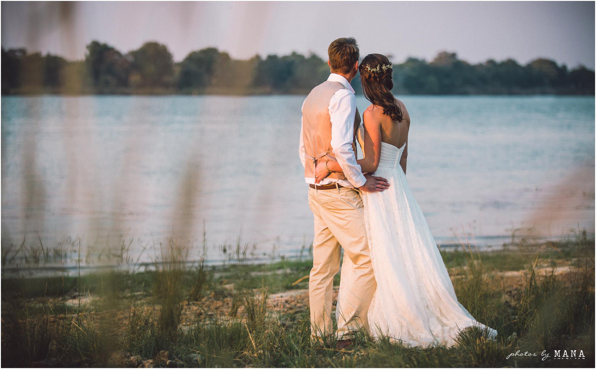 African safari wedding on the banks of the Zambezi River in Victoria Falls, Zimbabwe. Wedding planning by Vic Falls Occasions. Photography by Photos by Mana.