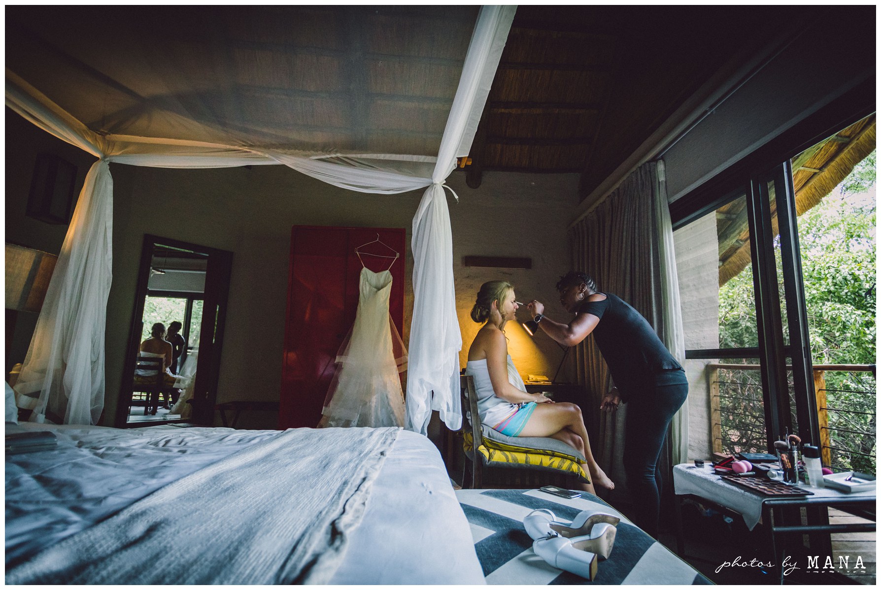 Destination safari bush wedding at Victoria Falls Safari Lodge in Victoria Falls, Zimbabwe, Africa. Destination safari wedding photograhy by Mana Meadows.