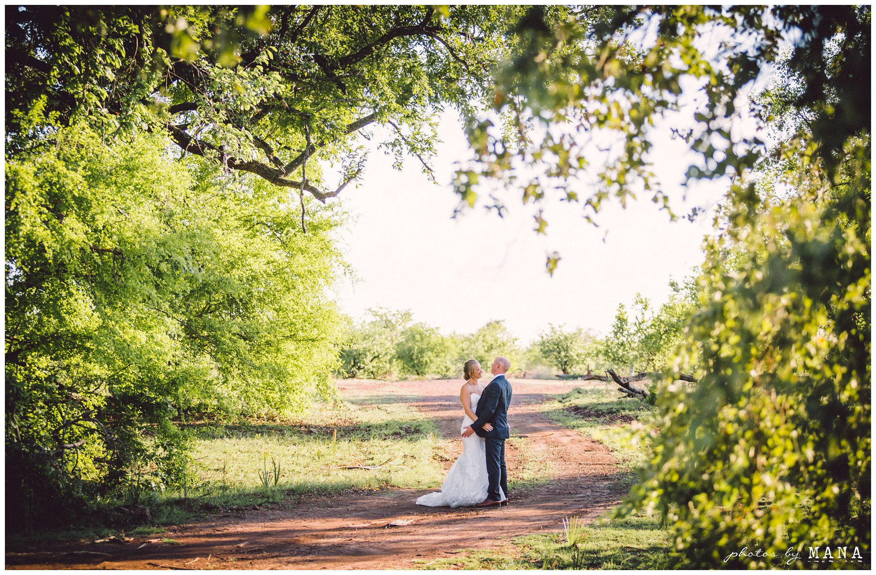 African safari wedding on the banks of the Zambezi River in Victoria Falls, Zimbabwe. Photography by Photos by Mana.