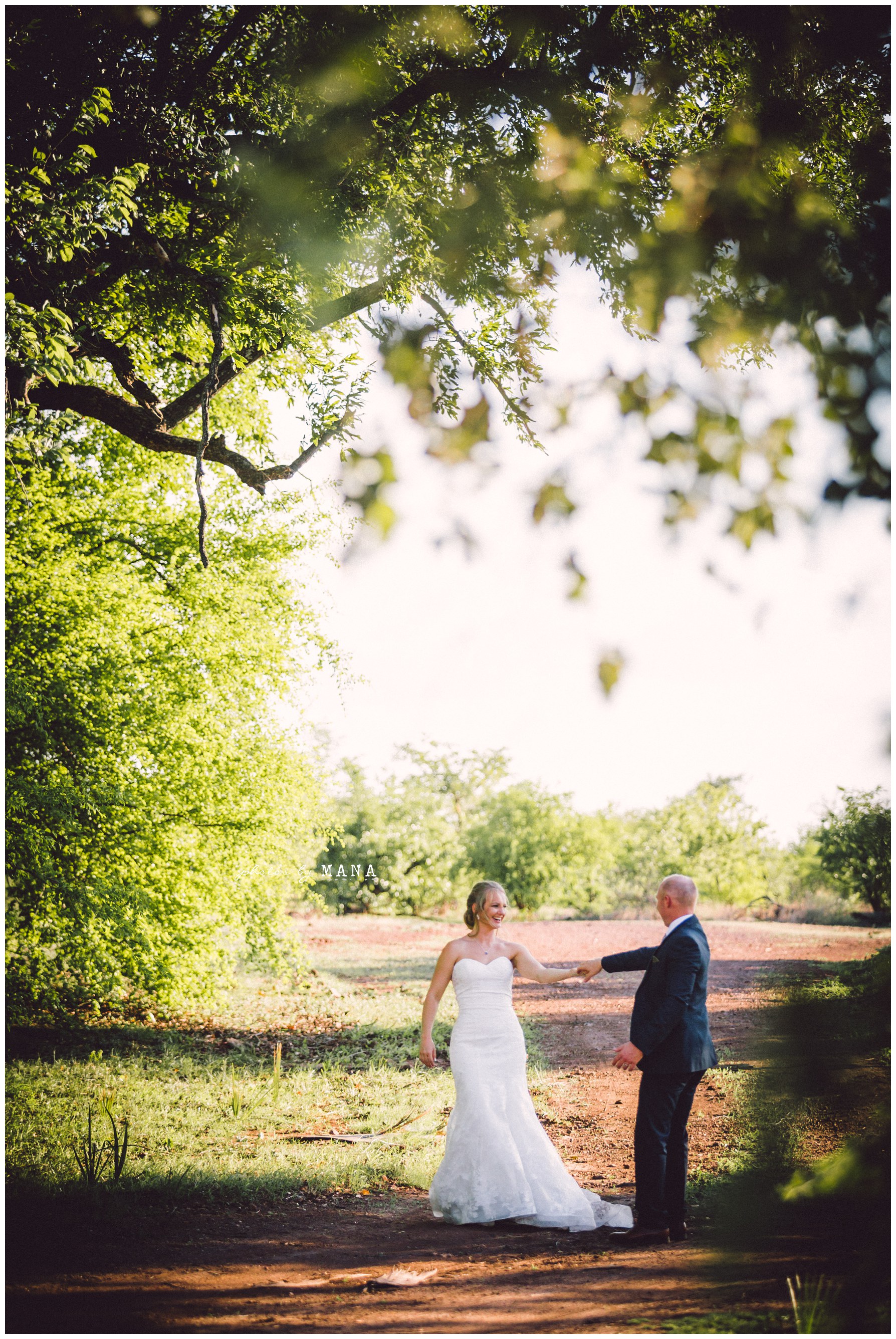 African safari wedding on the banks of the Zambezi River in Victoria Falls, Zimbabwe. Photography by Photos by Mana.