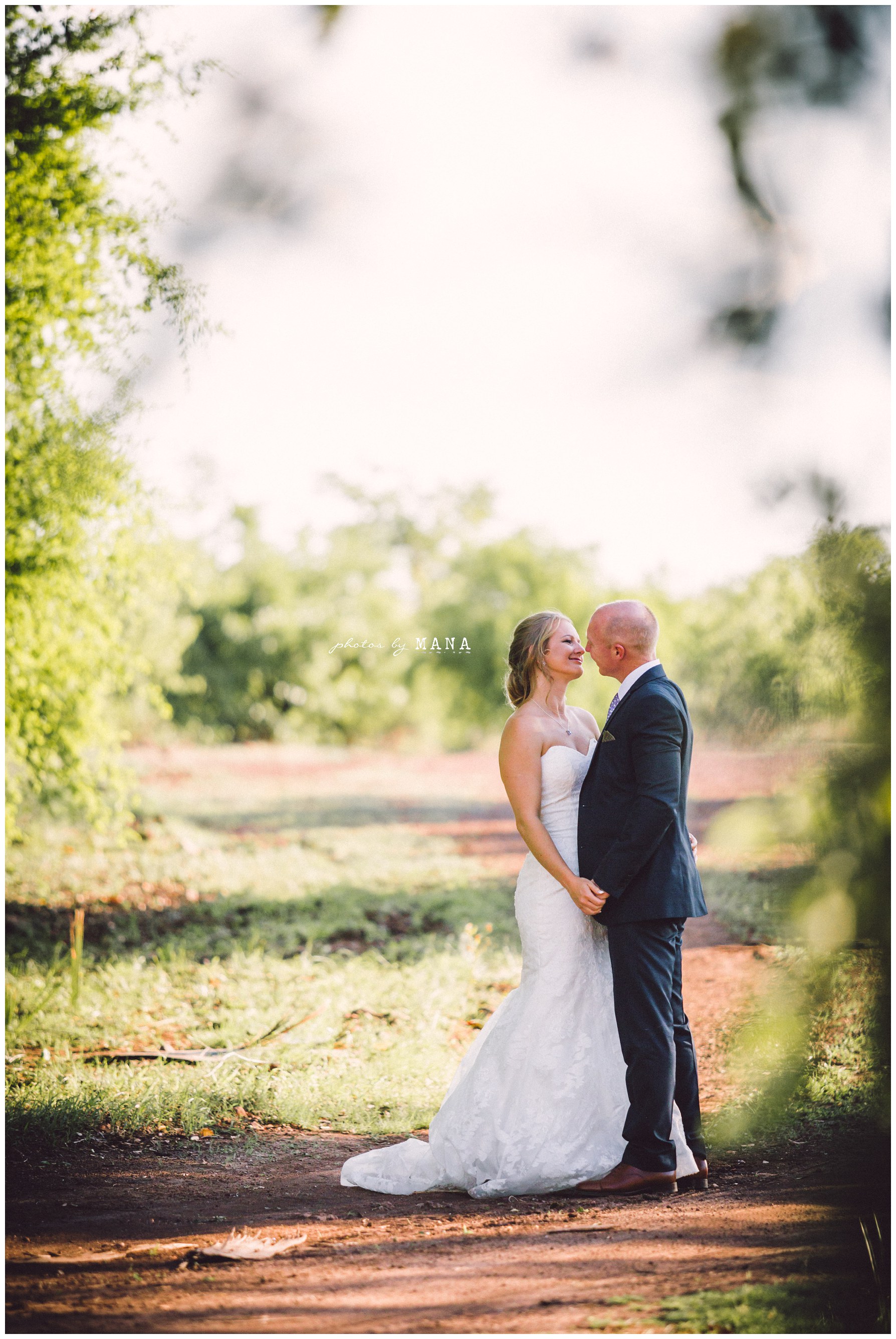 African safari wedding on the banks of the Zambezi River in Victoria Falls, Zimbabwe. Photography by Photos by Mana.