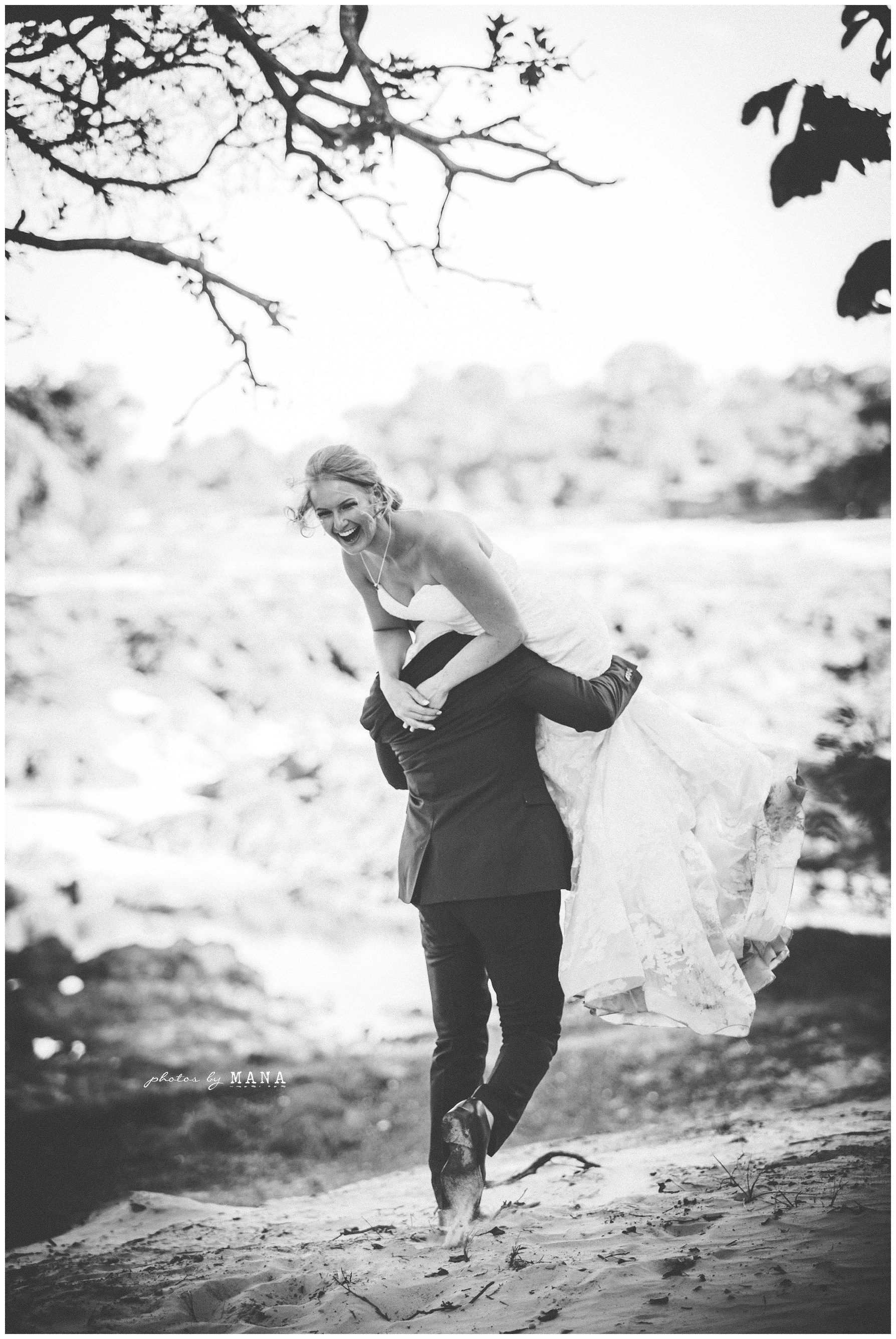 African safari wedding on the banks of the Zambezi River in Victoria Falls, Zimbabwe. Photography by Photos by Mana.