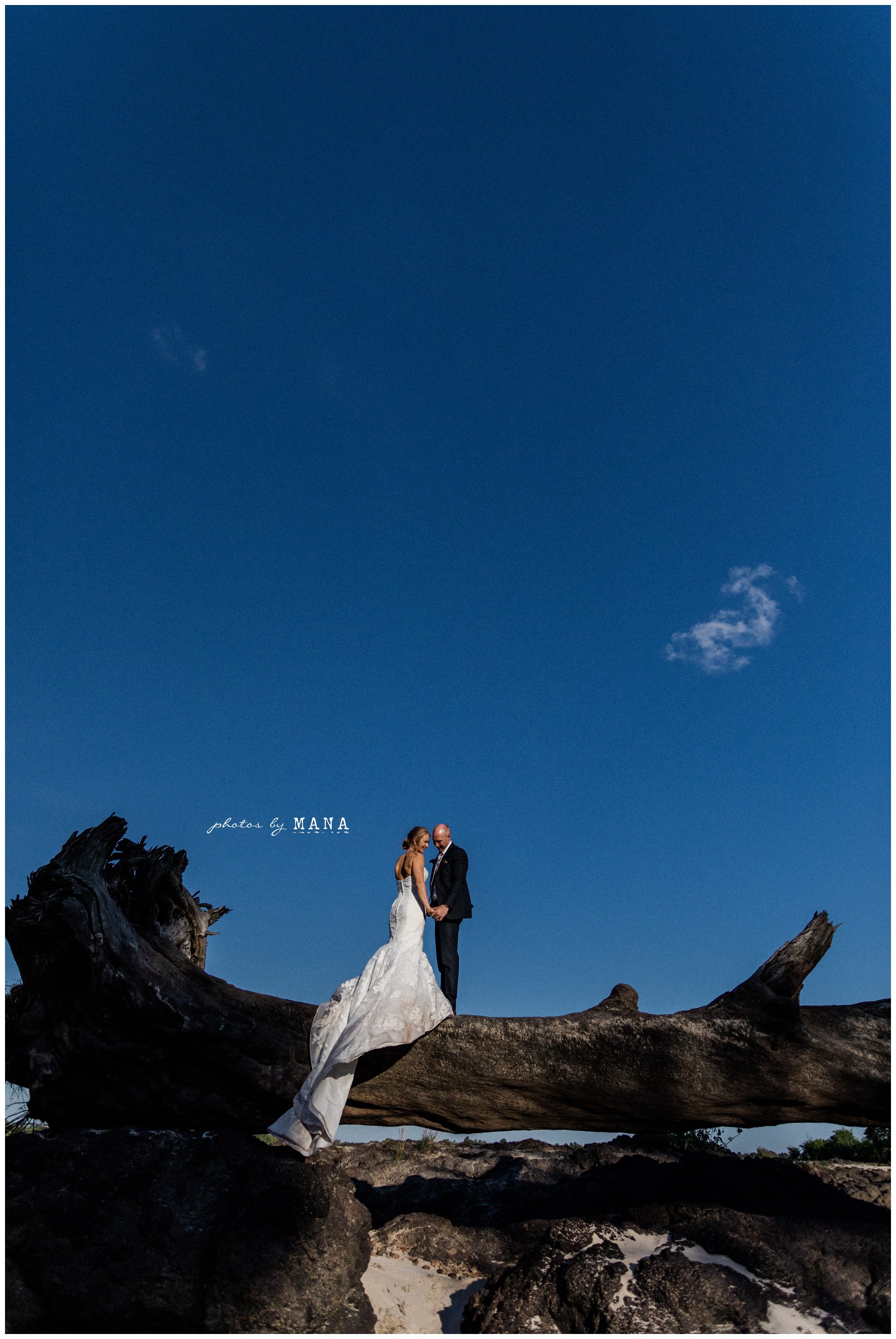 African safari wedding on the banks of the Zambezi River in Victoria Falls, Zimbabwe. Photography by Photos by Mana.