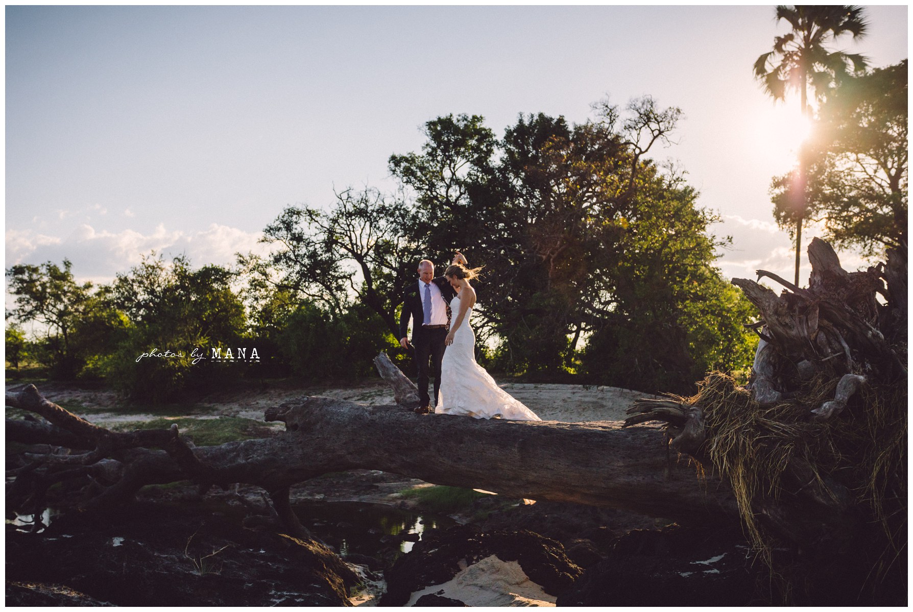 African safari wedding on the banks of the Zambezi River in Victoria Falls, Zimbabwe. Photography by Photos by Mana.