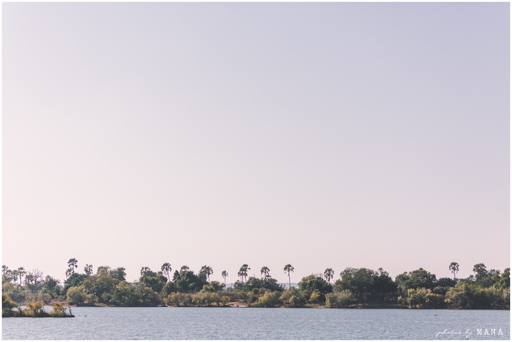 African safari wedding on the banks of the Zambezi River in Victoria Falls, Zimbabwe. Wedding planning byPure Africa Weddings. Photography by Photos by Mana.