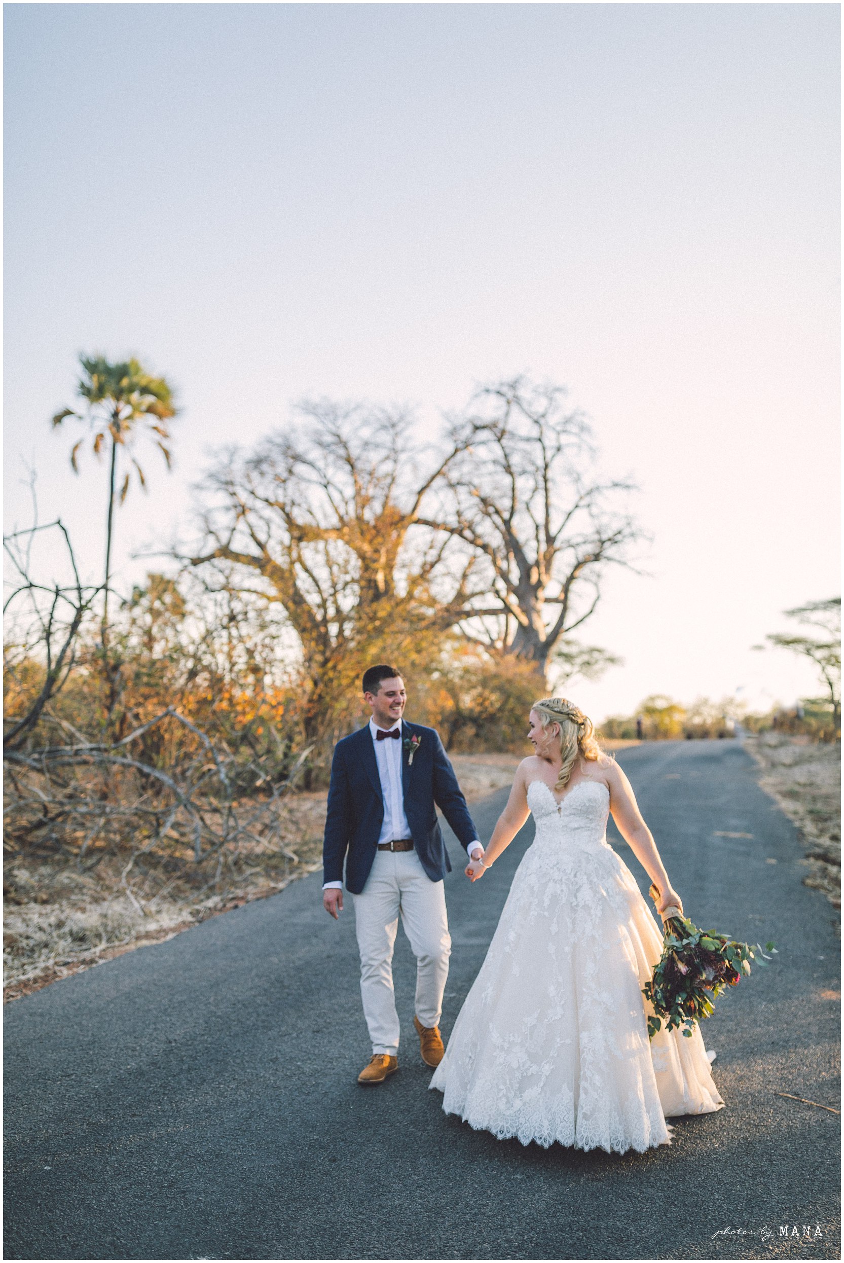 African safari wedding on the banks of the Zambezi River in Victoria Falls, Zimbabwe. Wedding planning byPure Africa Weddings. Photography by Photos by Mana.