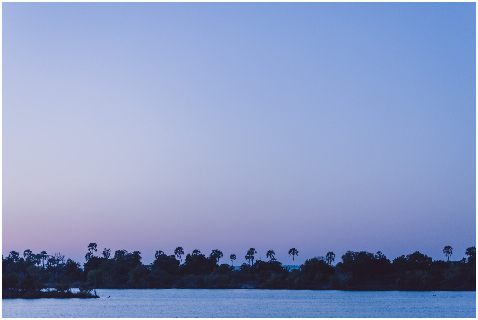 African safari wedding on the banks of the Zambezi River in Victoria Falls, Zimbabwe. Wedding planning byPure Africa Weddings. Photography by Photos by Mana.