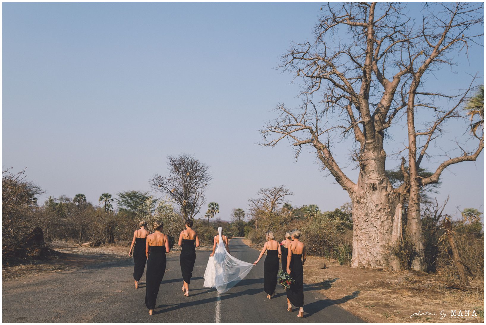 African safari wedding on the banks of the Zambezi River in Victoria Falls, Zimbabwe. Photography by Photos by Mana.