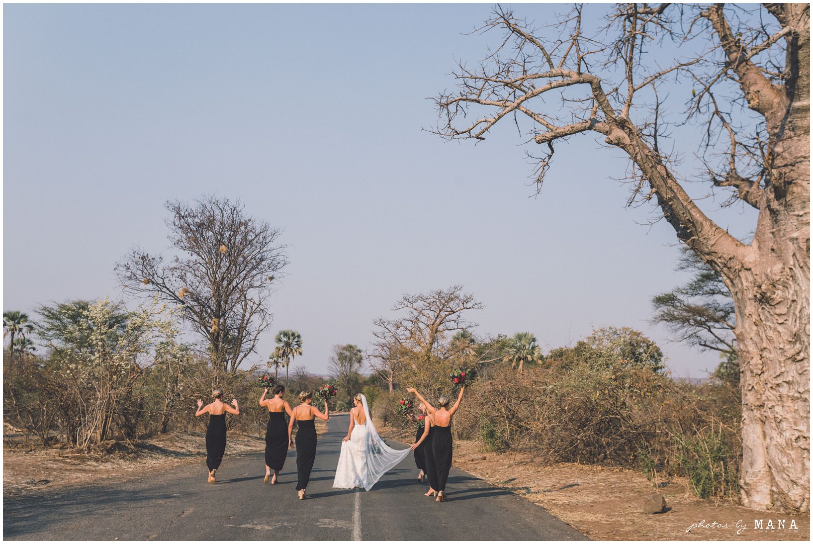 African safari wedding on the banks of the Zambezi River in Victoria Falls, Zimbabwe. Photography by Photos by Mana.