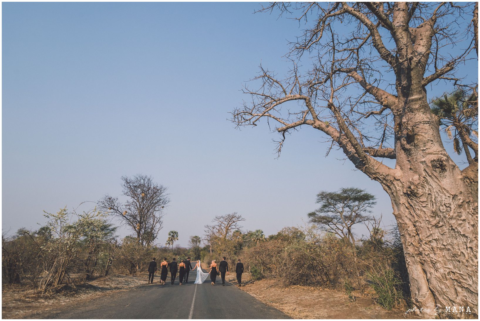 African safari wedding on the banks of the Zambezi River in Victoria Falls, Zimbabwe. Photography by Photos by Mana.
