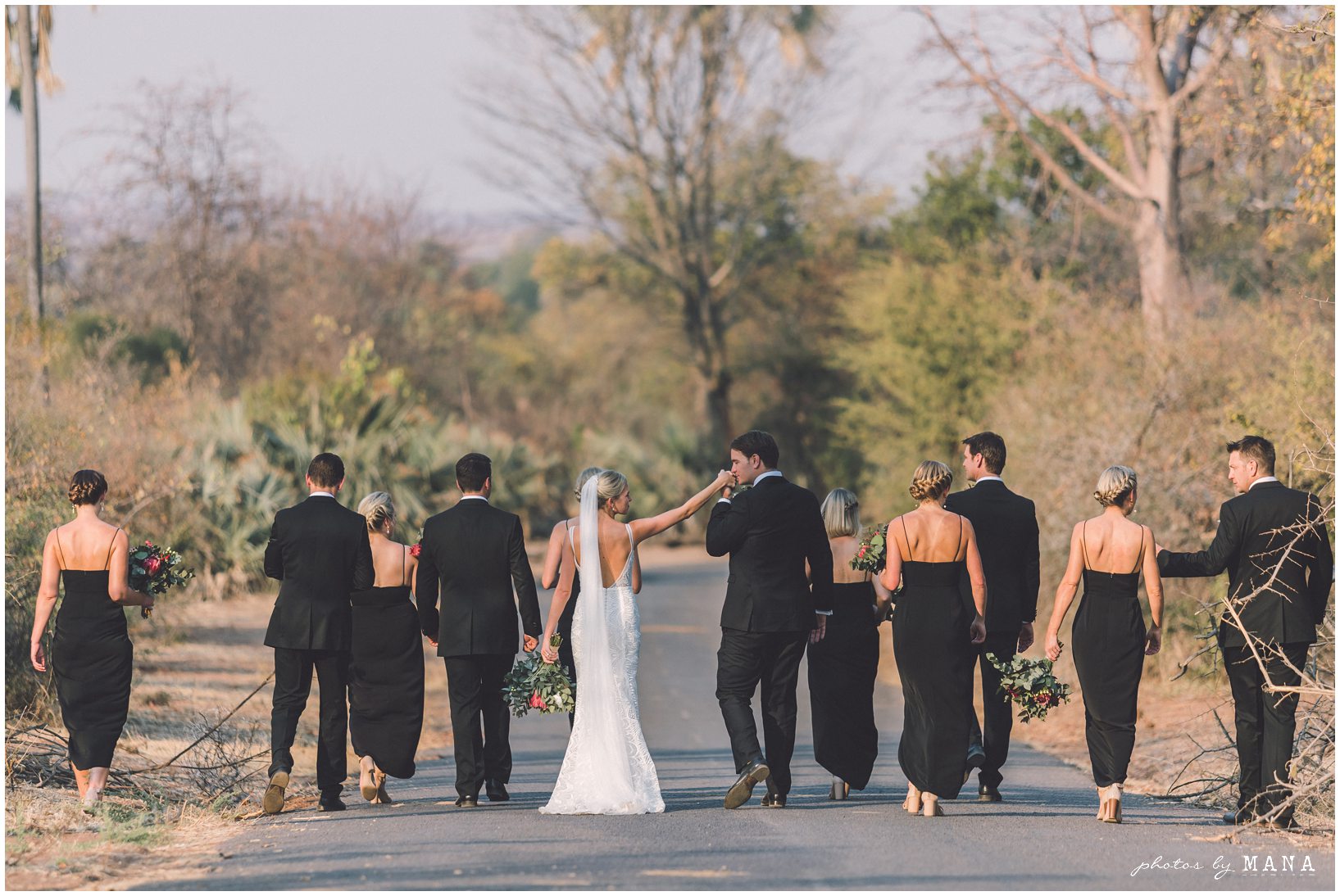 African safari wedding on the banks of the Zambezi River in Victoria Falls, Zimbabwe. Photography by Photos by Mana.