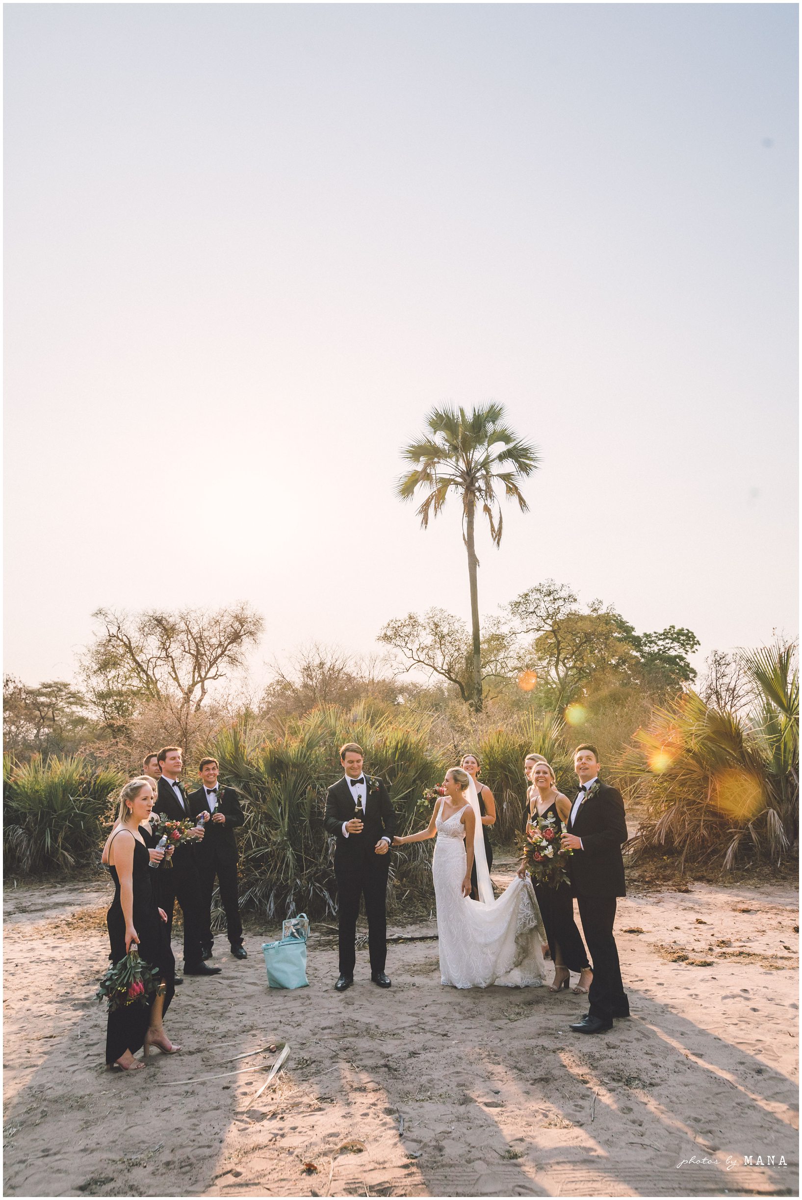 African safari wedding on the banks of the Zambezi River in Victoria Falls, Zimbabwe. Photography by Photos by Mana.