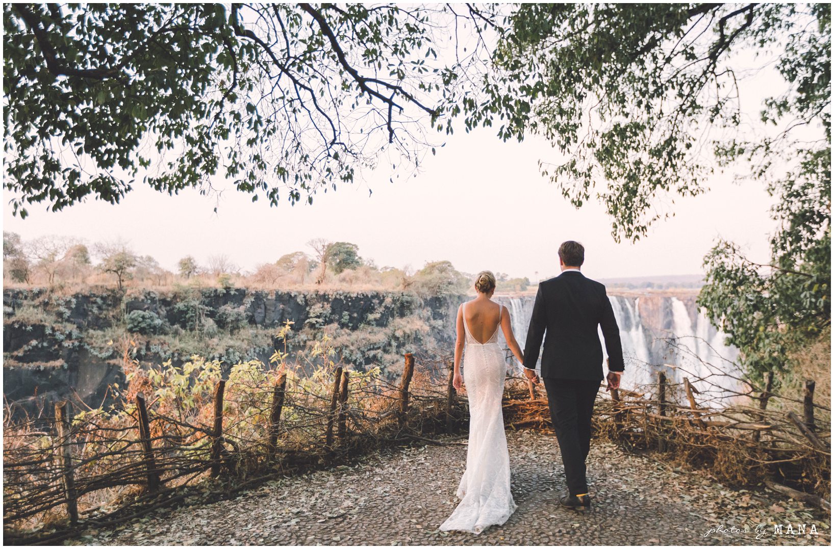 African safari wedding on the banks of the Zambezi River in Victoria Falls, Zimbabwe. Photography by Photos by Mana.